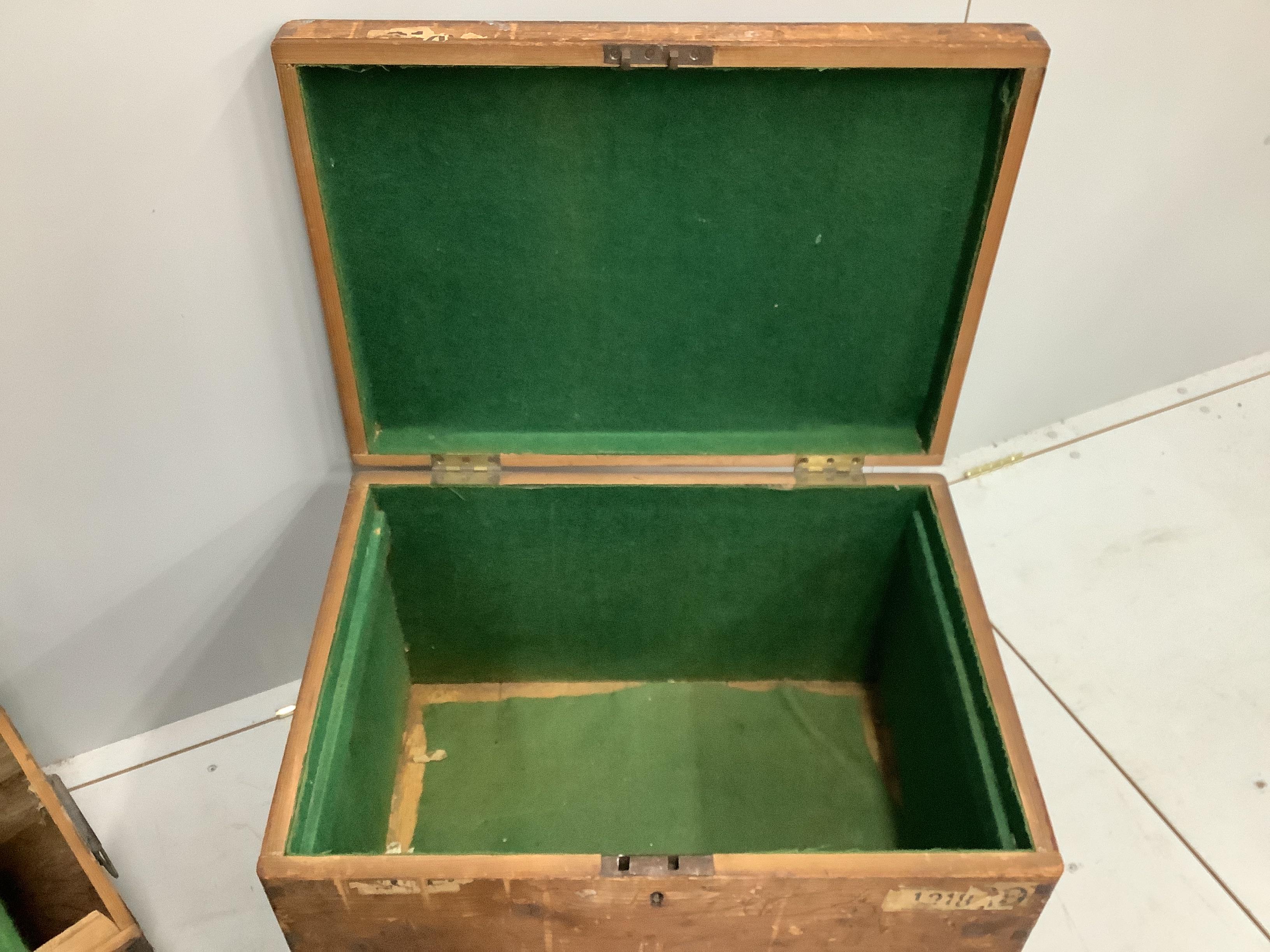 A Victorian rectangular pine trunk, width 65cm, depth 47cm, height 43cm together with a smaller later iron bound trunk